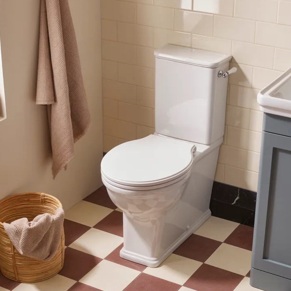 Lifestyle image of the Tavistock Marston Close Coupled Back to Wall Toilet with Handle